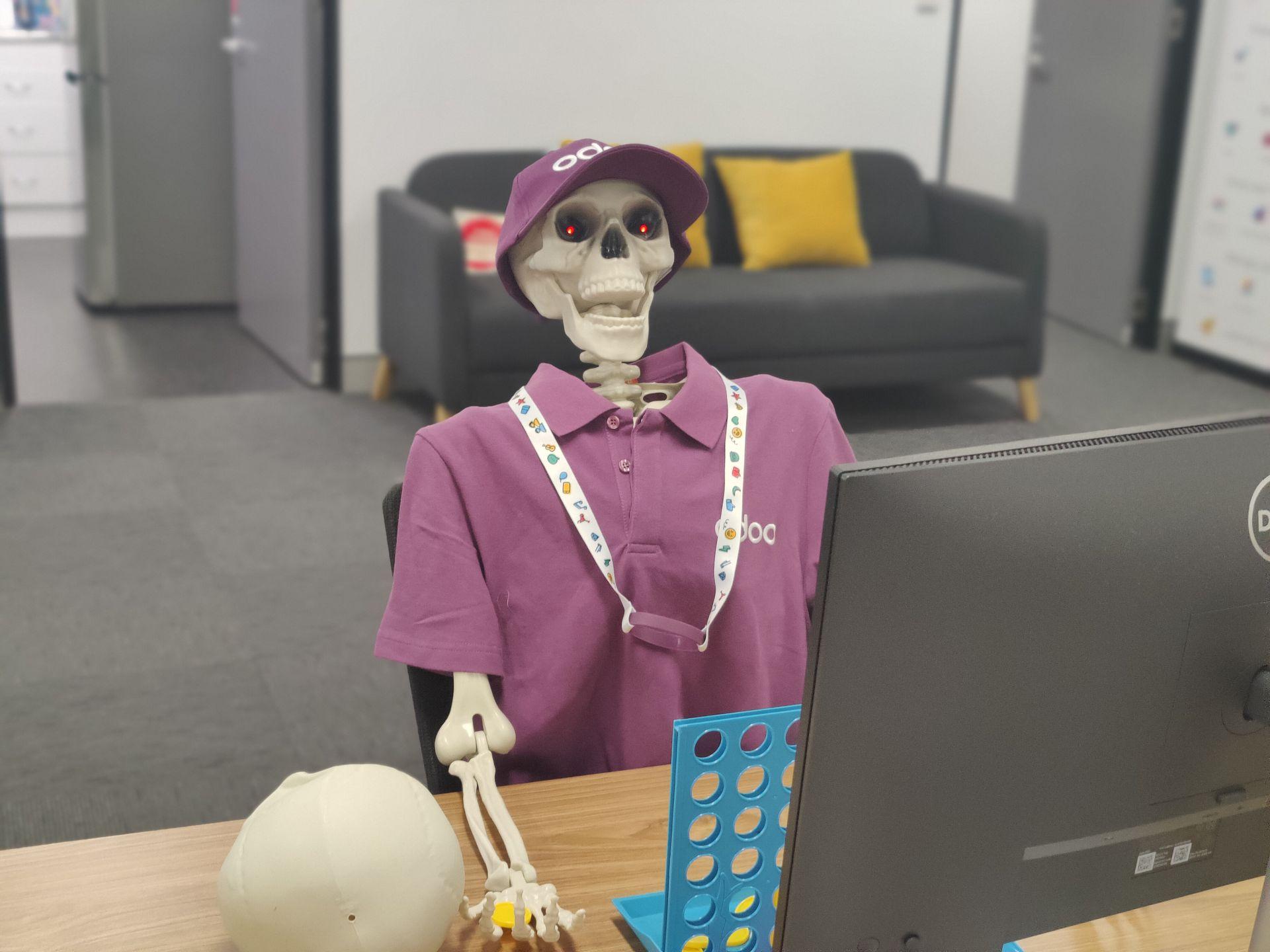 Odoo employee at their desk working