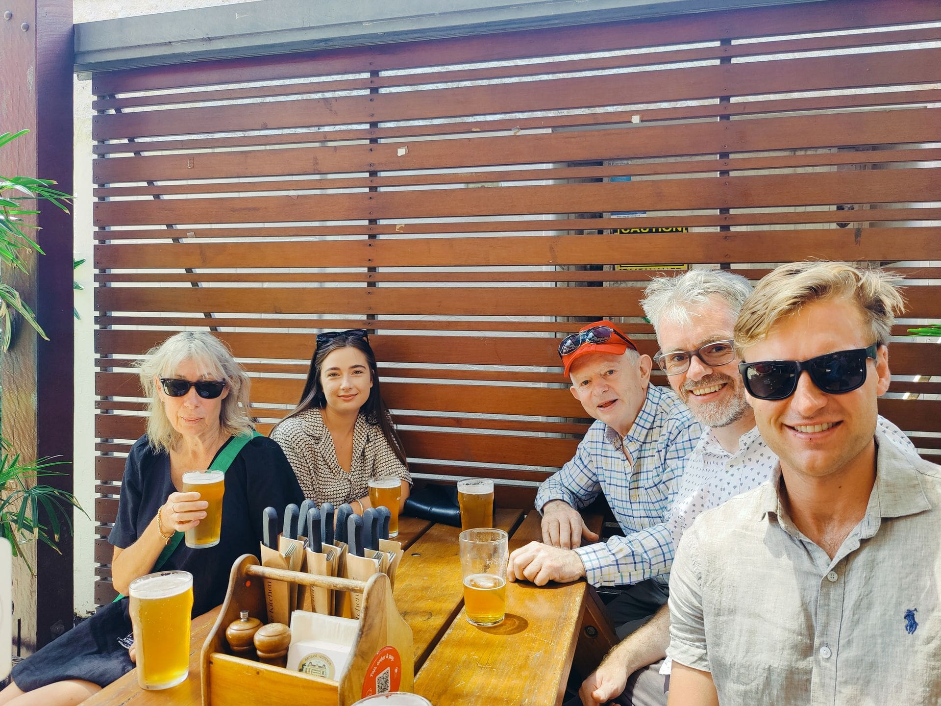 group of people drinking at a pub